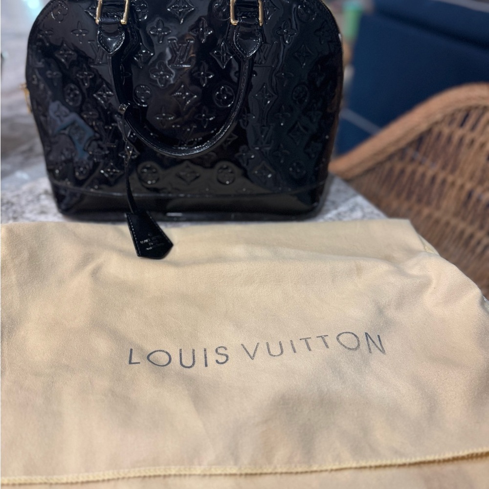 Louis Vuitton Black Satchel with Monogram Embossing